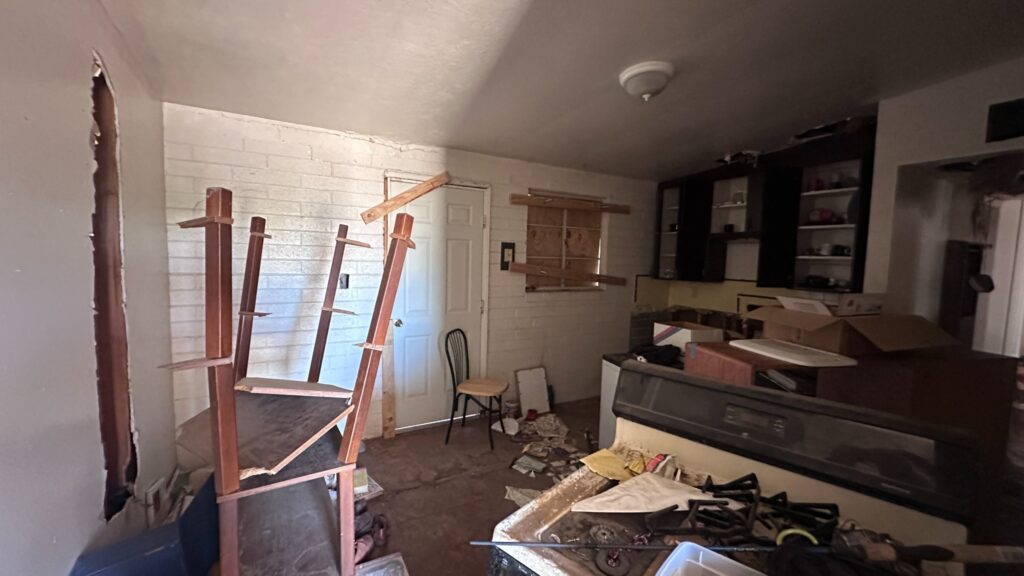 Damaged kitchen before renovation